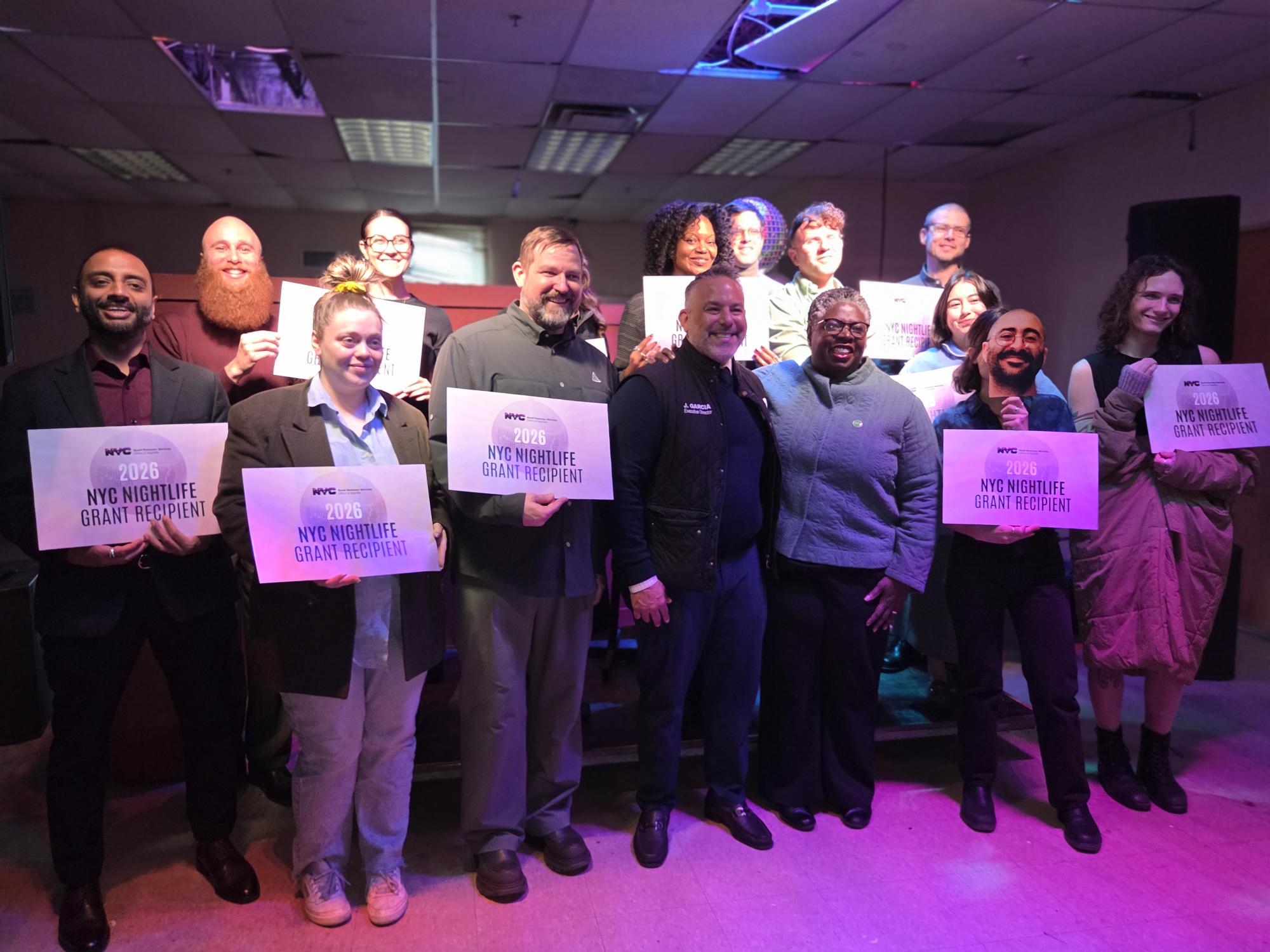 Attendees and grantees gathered for a photo with S B S Commissioner Dynishal Gross
                                           